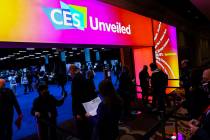 Attendees arrive for the CES Unveiled event at the Mandalay Bay Convention Center Monday, Jan. ...