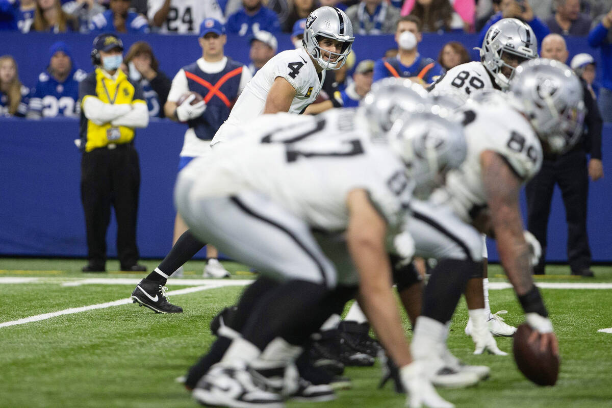 Raiders quarterback Derek Carr (4) lines up at wide receiver during the first half of an NFL fo ...
