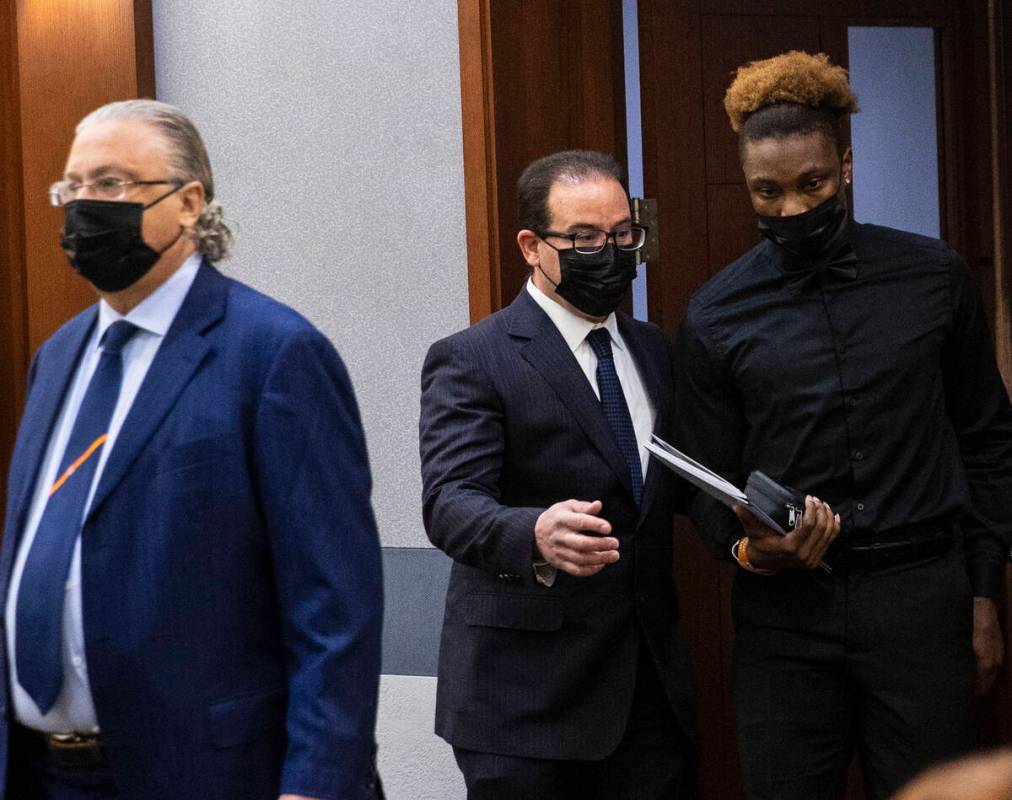 Henry Ruggs, right, former Raiders wide receiver, accused of DUI resulting in death, enters the ...