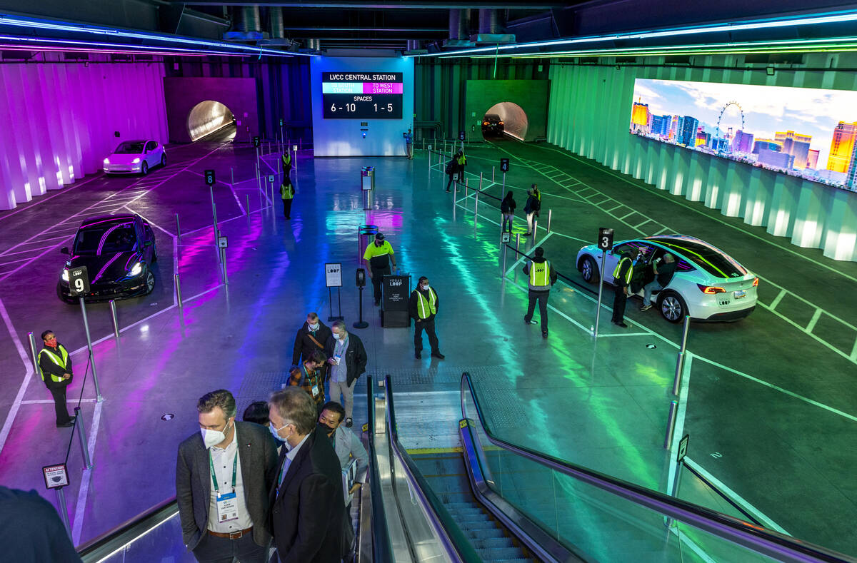 Passengers arrive and depart from the Central Hall station underground on the Boring Company's ...