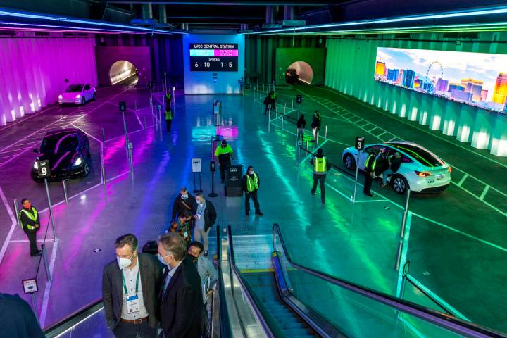 Passengers arrive and depart from the Central Hall station underground on the Boring Company's ...