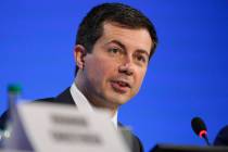 FILE - Secretary of Transportation Pete Buttigieg speaks at the COP26 U.N. Climate Summit, in G ...