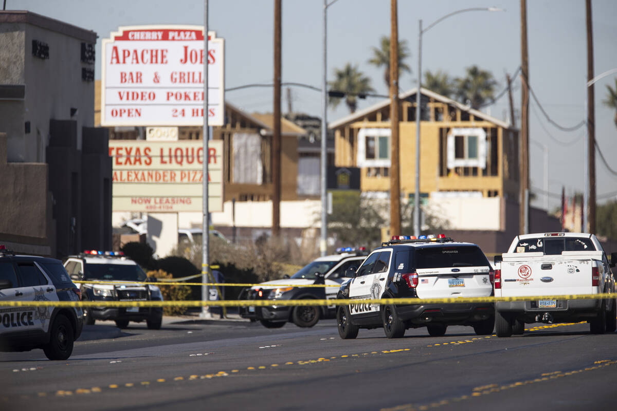 Las Vegas police investigate the scene of an officer involved shooting near the intersection o ...