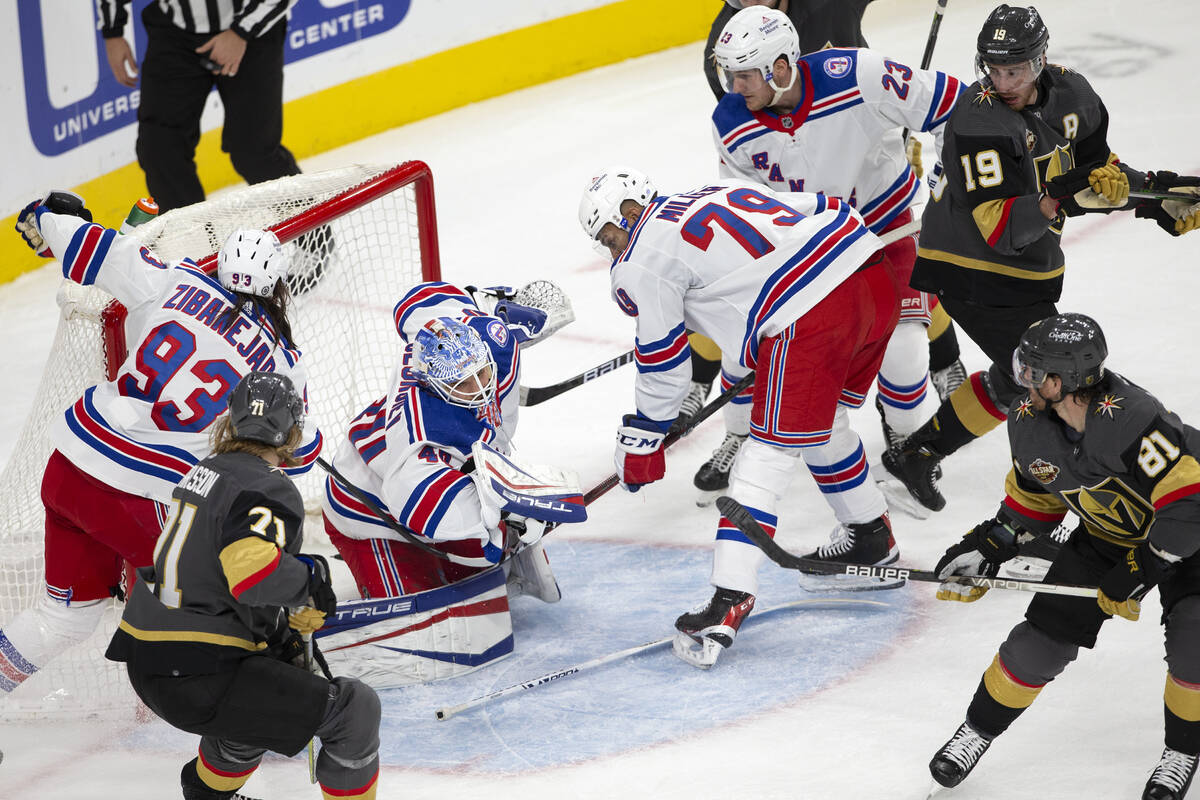 Golden Knights center Jonathan Marchessault (81) shoots a successful goal against Rangers goalt ...