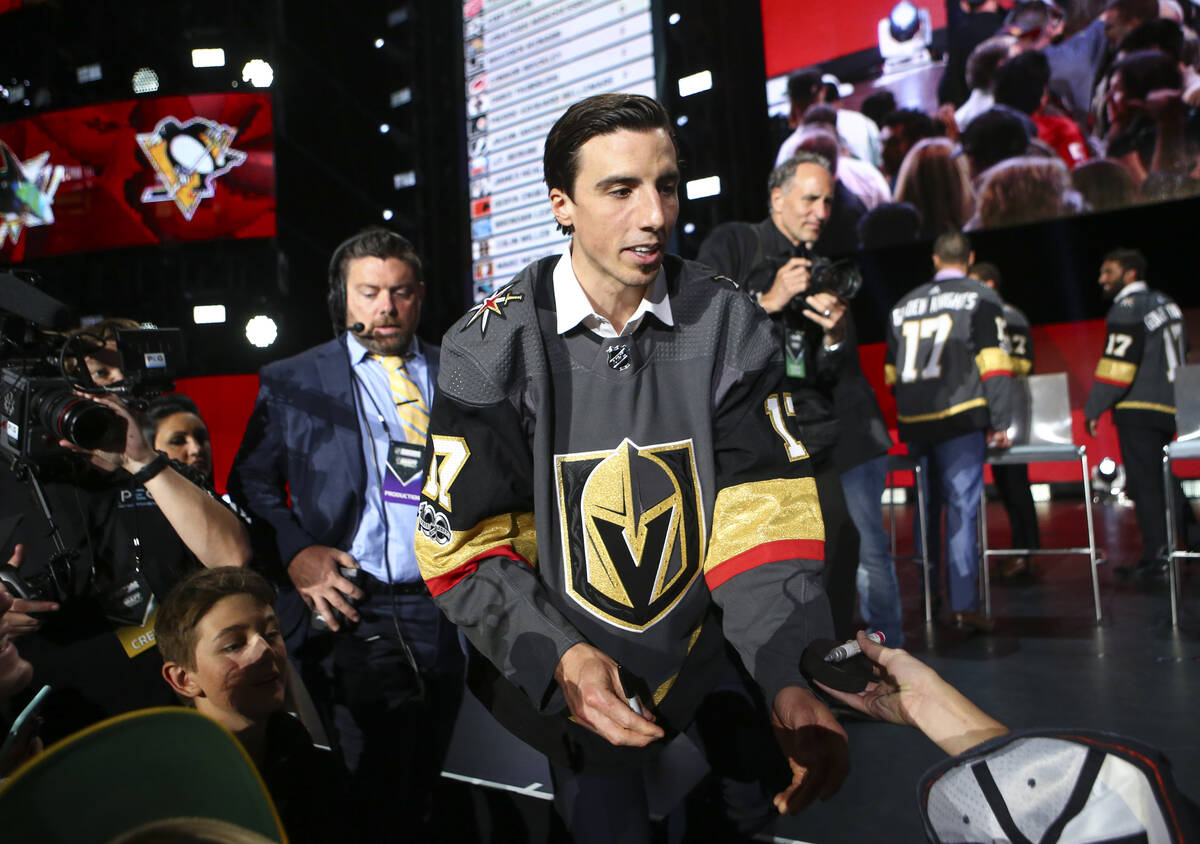 Vegas Golden Knights' Marc-Andre Fleury signs autographs following a roundtable after the NHL A ...
