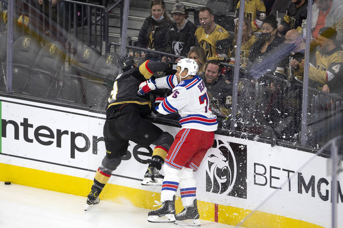 Rangers right wing Ryan Reaves (75), a former Golden Knight, slams Golden Knights defenseman Br ...