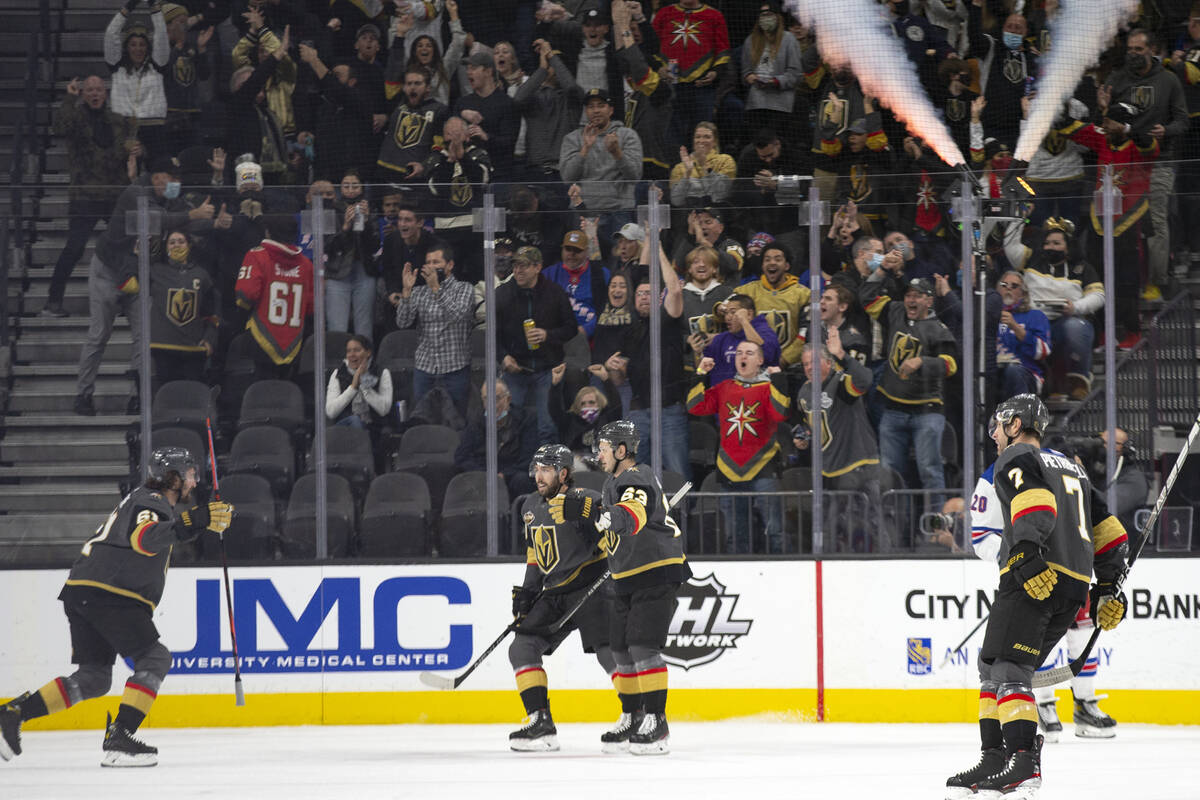 Golden Knights center Chandler Stephenson (20), right wing Evgenii Dadonov (63) and defenseman ...