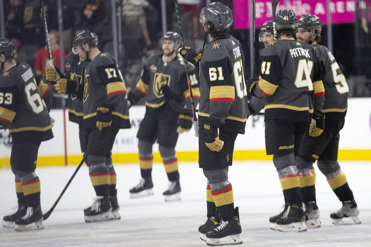 The Golden Knights skate off the ice after winning against the Rangers in an NHL hockey game at ...