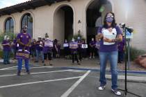 SEIU Local 1107 HCA healthcare worker Erika Watanabe speaks to the media while waiting to deliv ...