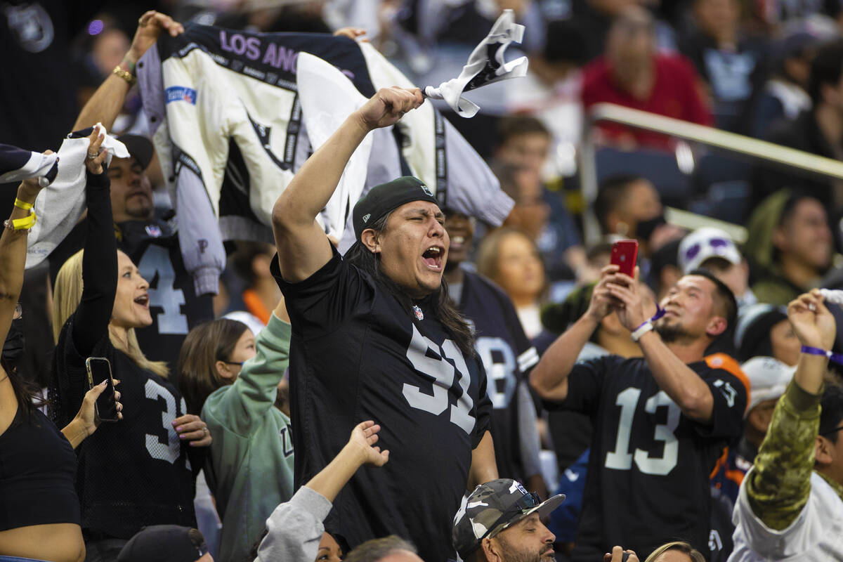 Raiders fans during an NFL football game against the Denver Broncos on Sunday, Dec. 26, 2021, a ...