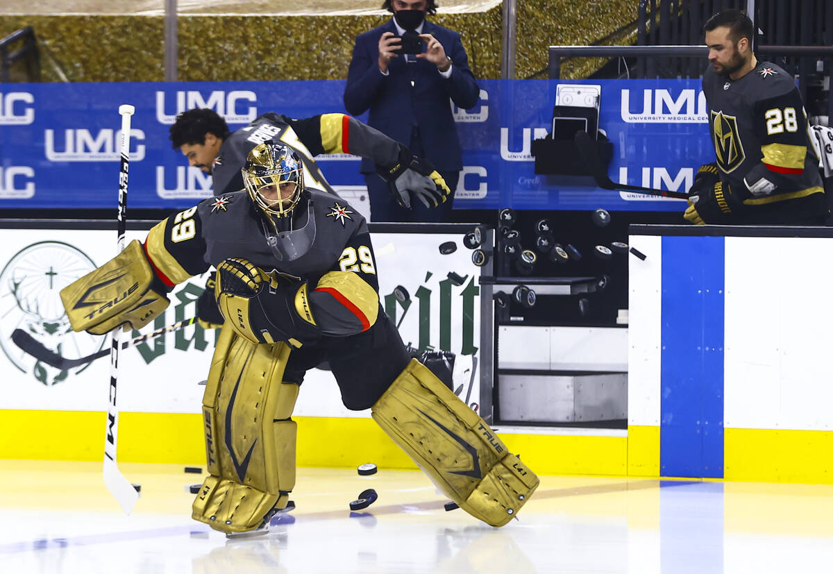 Golden Knights mgoaltender Marc-Andre Fleury warms up before Game 3 of an NHL hockey Stanley Cu ...