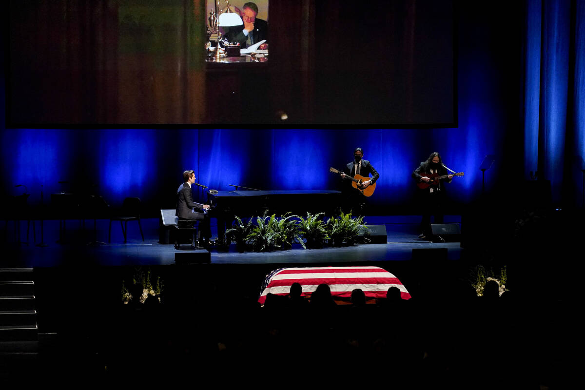 Brandon Flowers, lead singer of the Las Vegas-based rock band The Killers, performs "Be St ...