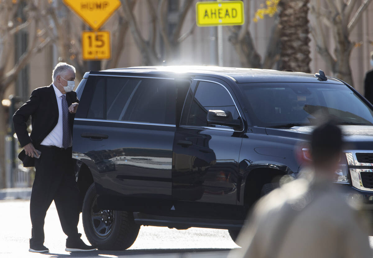 Gov. Steve Sisolak, left, leaves The Smith Center at the conclusion of a memorial service honor ...