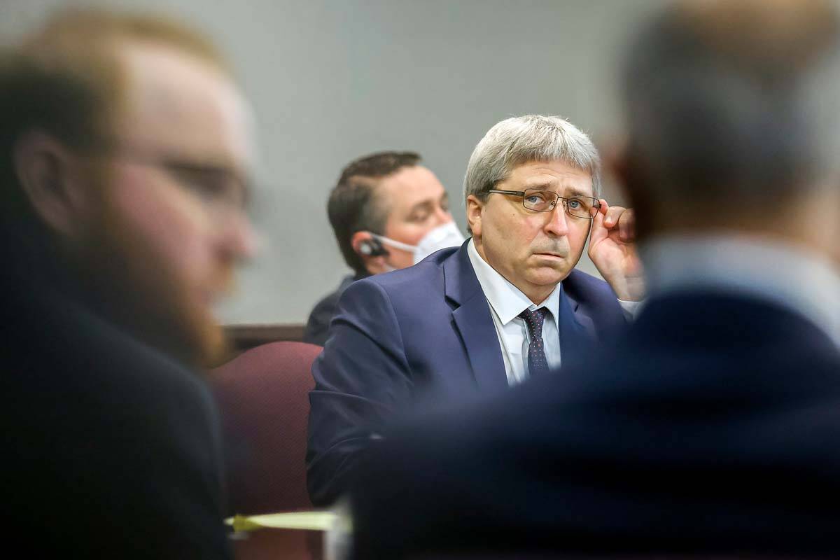 William "Roddie" Bryan, right, waits for his sentencing along with Greg McMichael, an ...