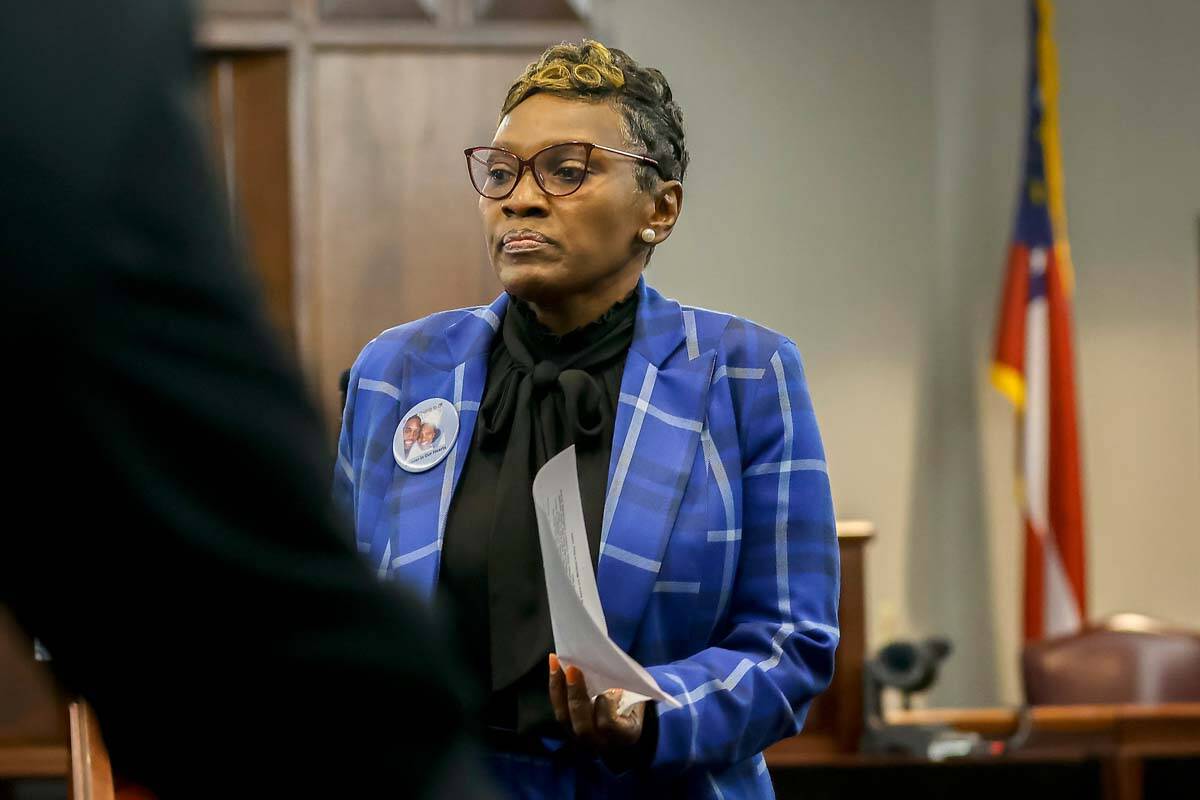 Ahmaud Arbery's mother, Wanda Cooper-Jones leaves the podium after giving her impact statement ...