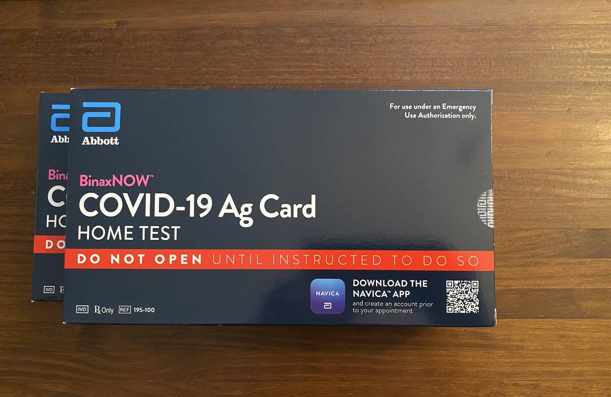 A pair of Abbott BinaxNOW COVID-19 tests