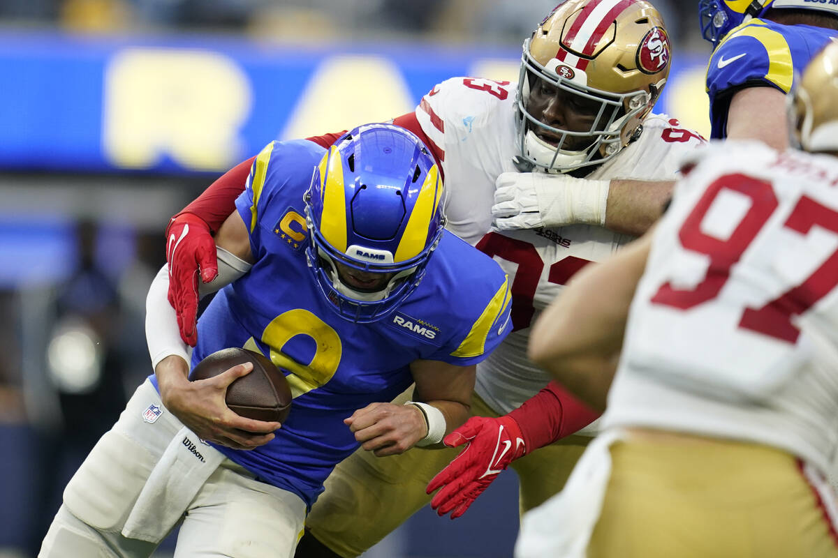 San Francisco 49ers defensive tackle D.J. Jones (93) sacks Los Angeles Rams quarterback Matthew ...