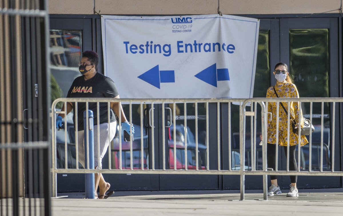 People enter the free walk-up COVID-19 testing offered at Cashman Center in partnership with Un ...