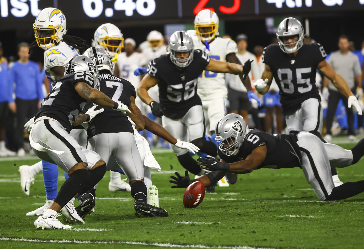 Raiders linebacker Divine Deablo (5) recovers a fumble by the Los Angeles Chargers during the f ...