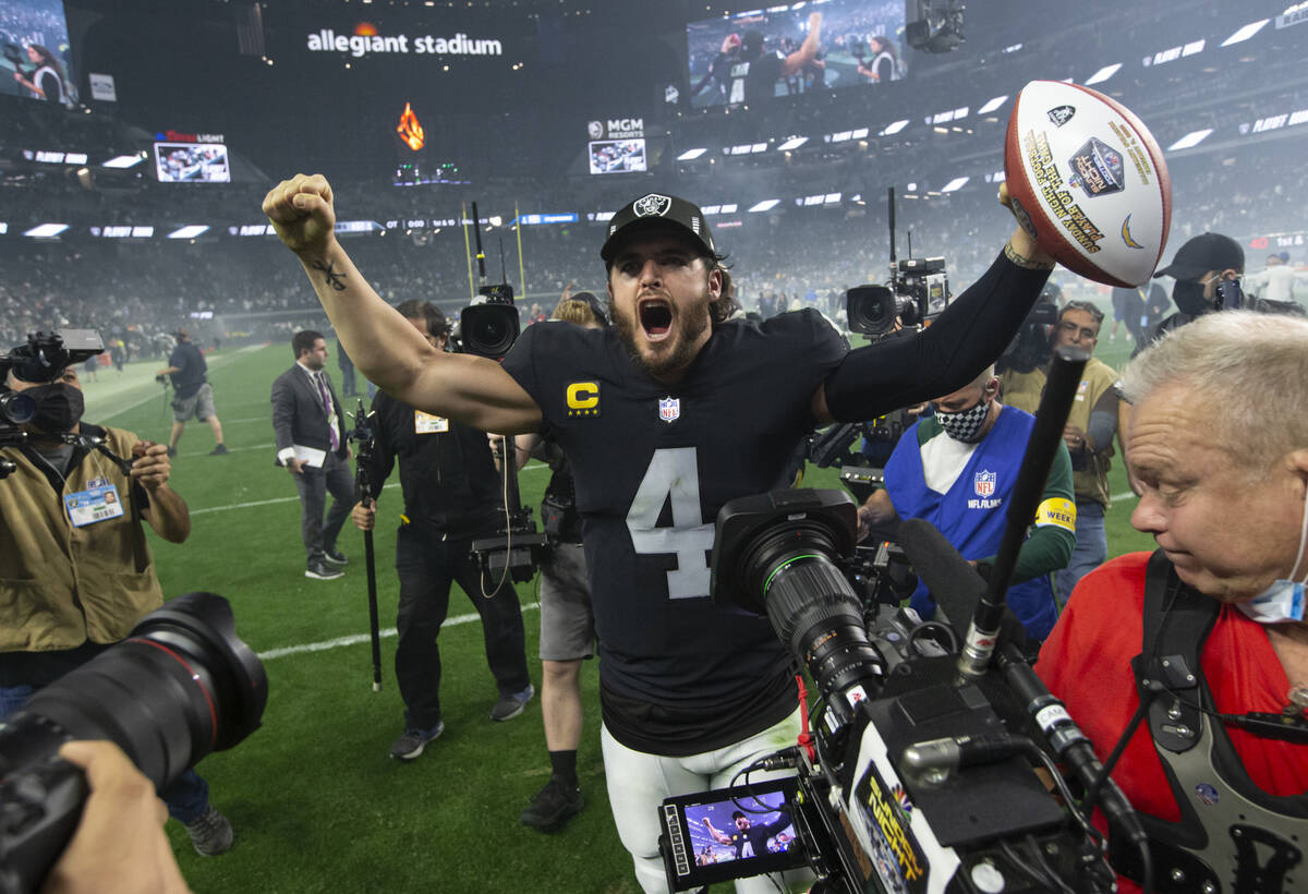 Raiders quarterback Derek Carr celebrates the team’s overtime win against the Los Angele ...