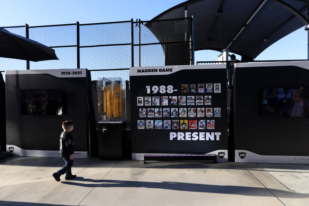 A John Madden memorial gallery is displayed outside of Allegiant Stadium in Las Vegas, Sunday, ...