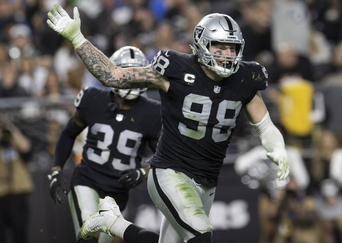 Raiders defensive end Maxx Crosby (98) celebrates a big defensive play in the second half durin ...