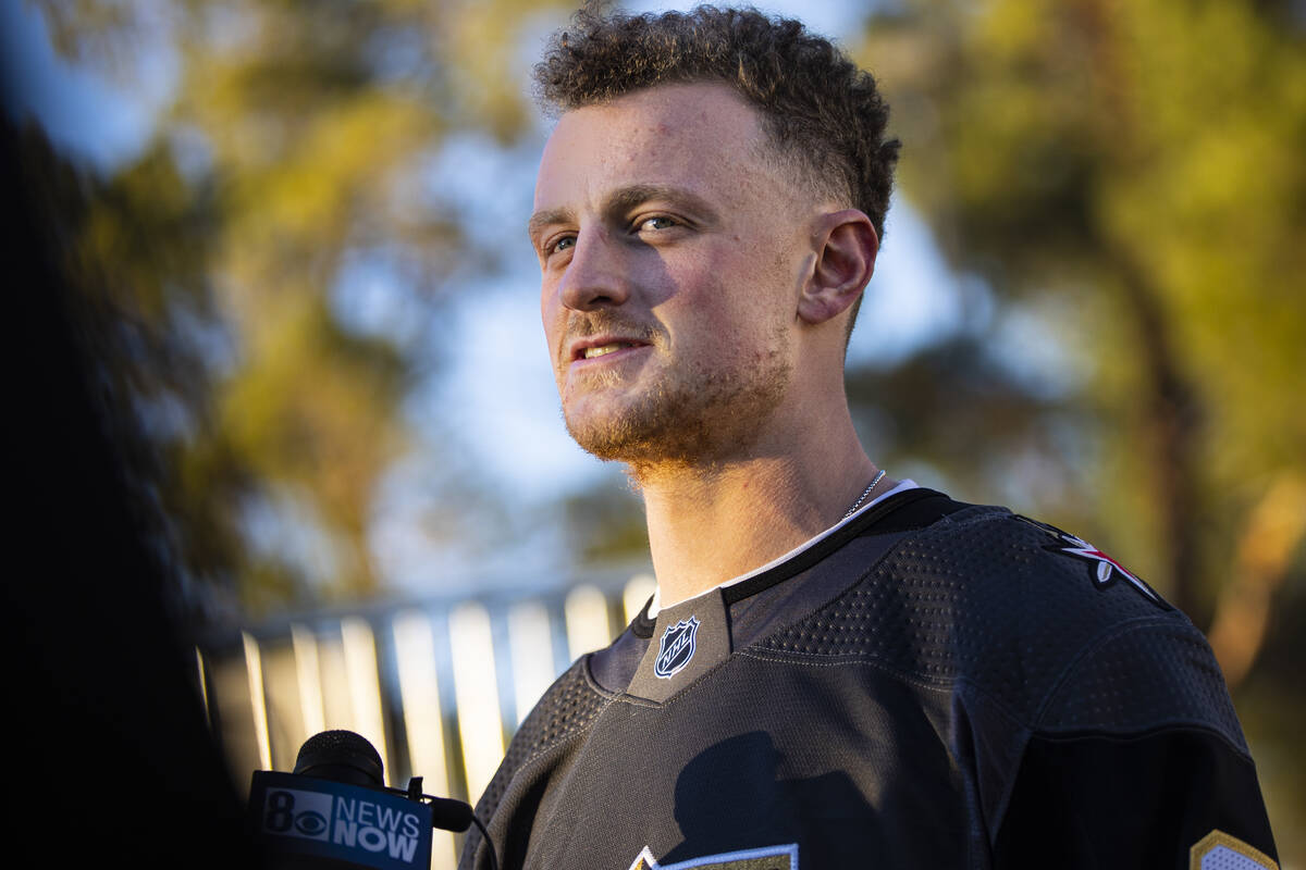 Newly acquired Golden Knights center Jack Eichel talks with members of the media during a break ...