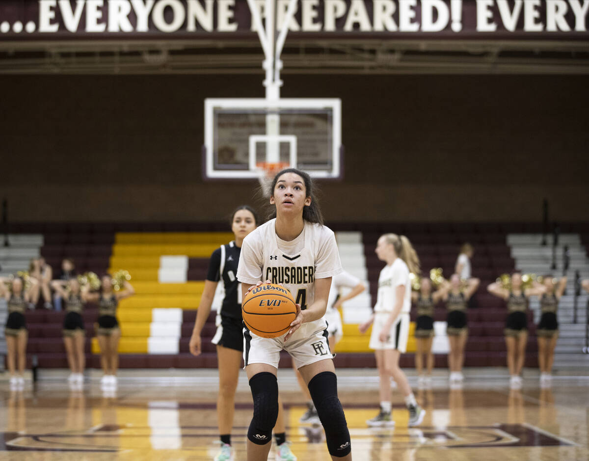 Faith Lutheran’s Leah Mitchell (34) shoots a free throw in the first quarter during a gi ...