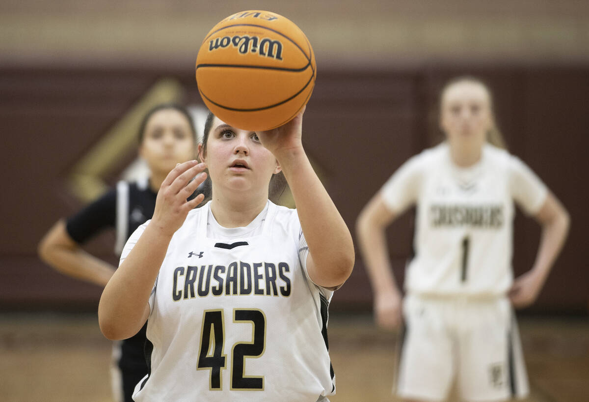 Faith Lutheran’s Lili Arnold (42) shoots a escaped  propulsion  successful  the 4th  fourth  during a gir ...
