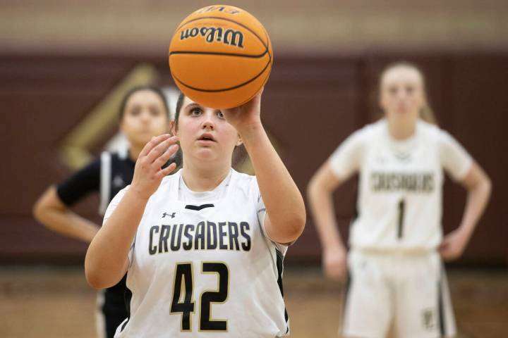 Faith Lutheran’s Lili Arnold (42) shoots a free throw in the fourth quarter during a gir ...