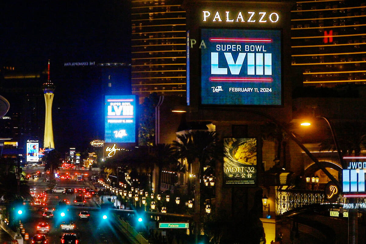 Marquees along the Strip show the announcement that Super Bowl III will be held in Las Vegas on ...
