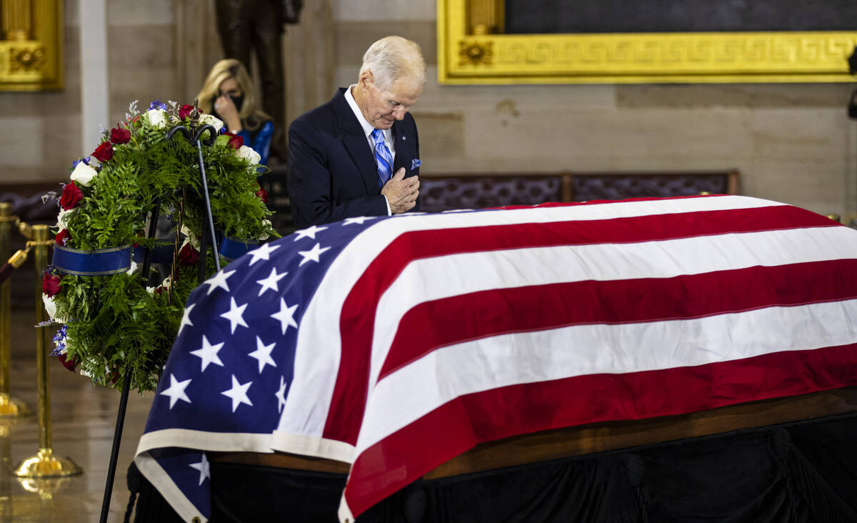 NASA Administrator Bill Nelson pays respects while viewing the flag-draped casket of former Sen ...