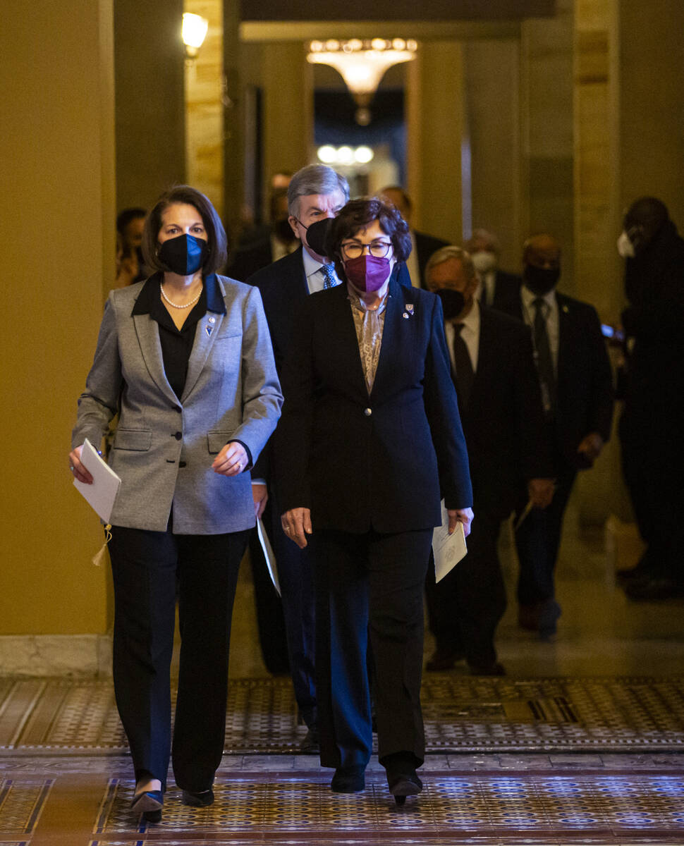 U.S. Sen. Catherine Cortez Masto, D-Nev., left, and U.S. Sen. Jacky Rosen, D-Nev., depart after ...