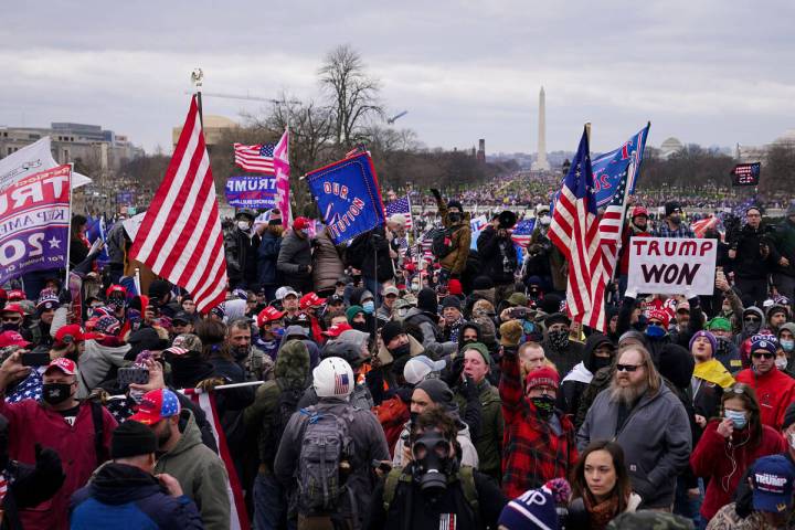 Trump supporters gather outside the Capitol, Wednesday, Jan. 6, 2021, in Washington. As Congres ...