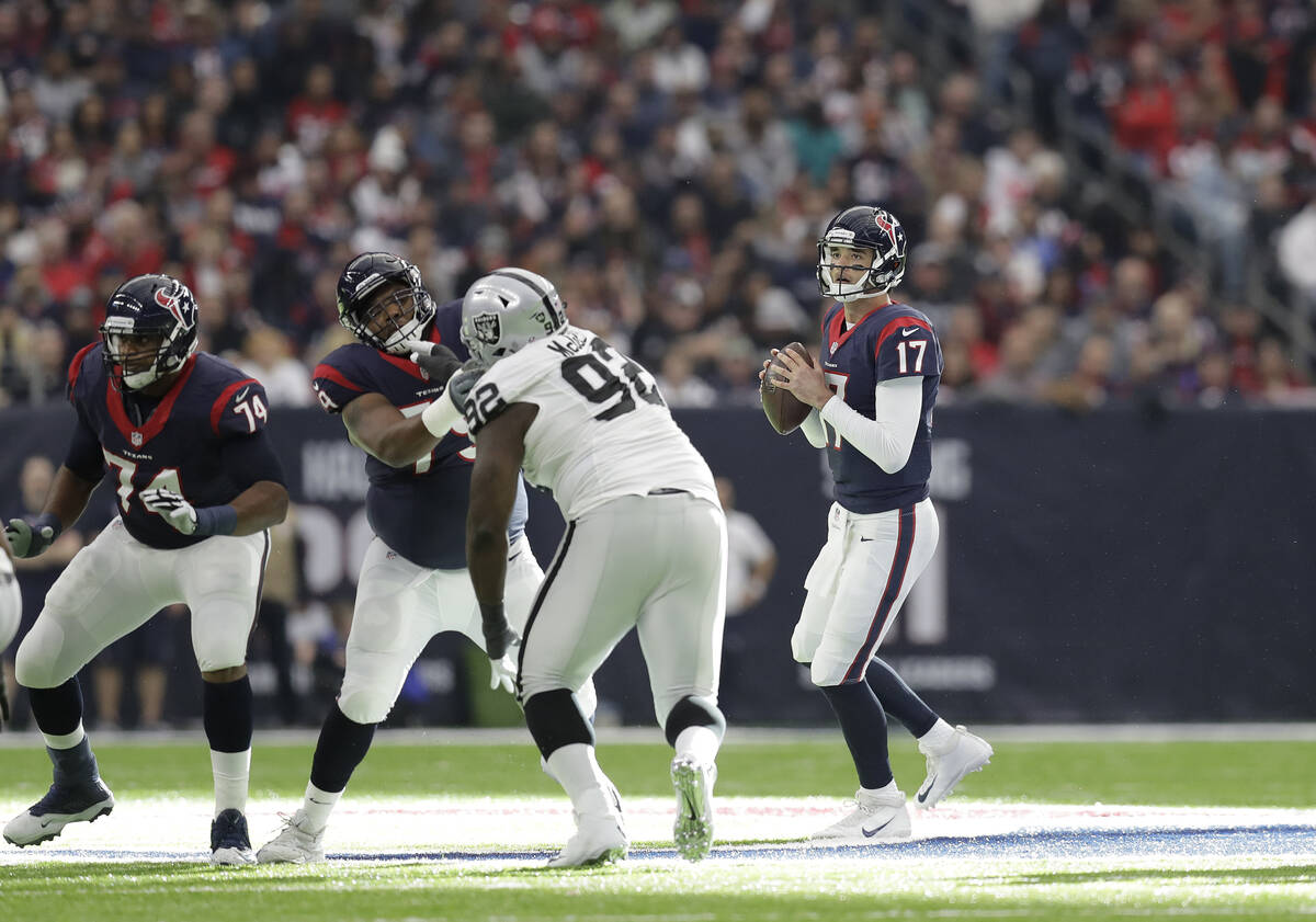 Houston Texans quarterback Brock Osweiler (17) works against the Oakland Raiders during the fir ...