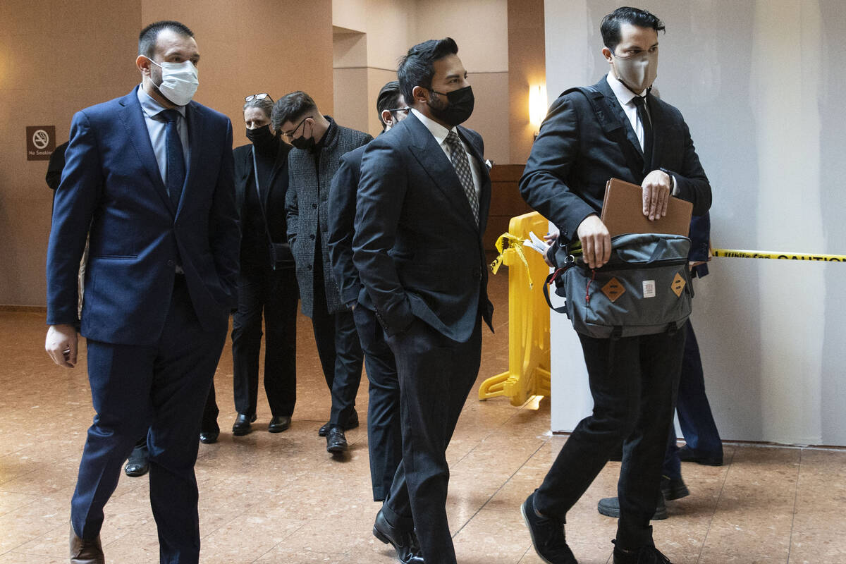 Relatives of victim Tina Tintor walk out of the courtroom after a status check on the case of f ...