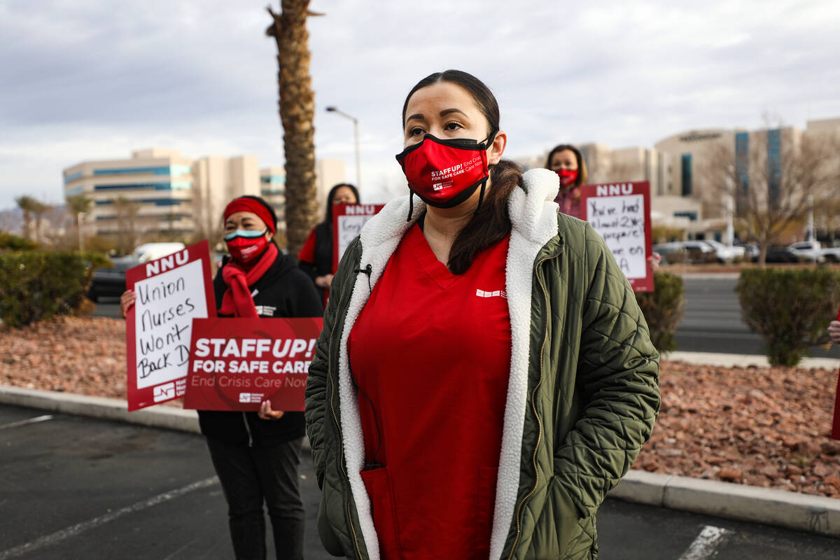 Brenda Saravia, a registered nurse at MountainView Hospital, addresses the media about poor wor ...