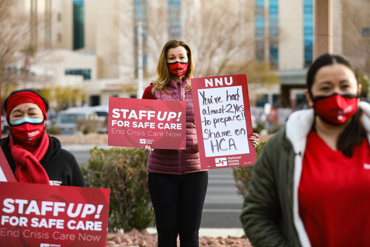 Christina Cuplin, center, a registered nurse at MountainView Hospital, joins her colleagues in ...