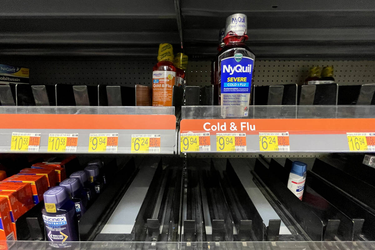Low supplies of cold and cough medicine are seen on shelves at Walmart, 8060 W Tropical Parkway ...