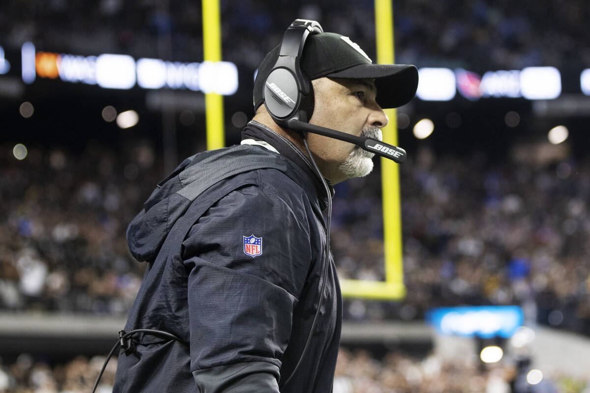 Raiders head coach Rich Bisaccia coaches Vegas in the second half during an NFL football game a ...