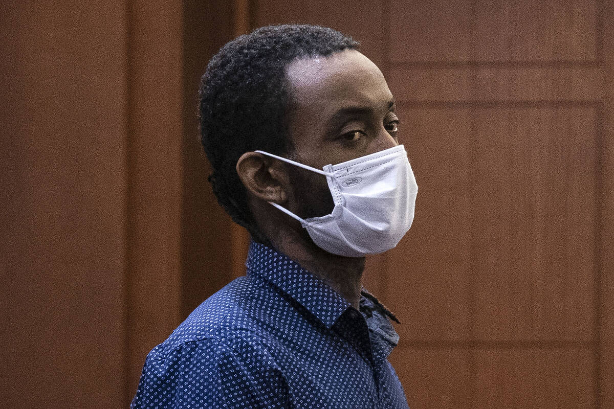 Justin Gaines, 30, accused of fatally shooting his father on Dec. 15, 2021, appears in court at ...