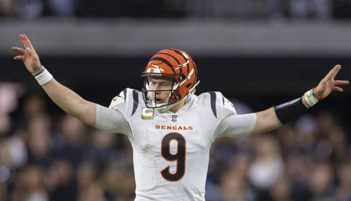 Cincinnati Bengals quarterback Joe Burrow (9) audibles in the second half during an NFL footbal ...
