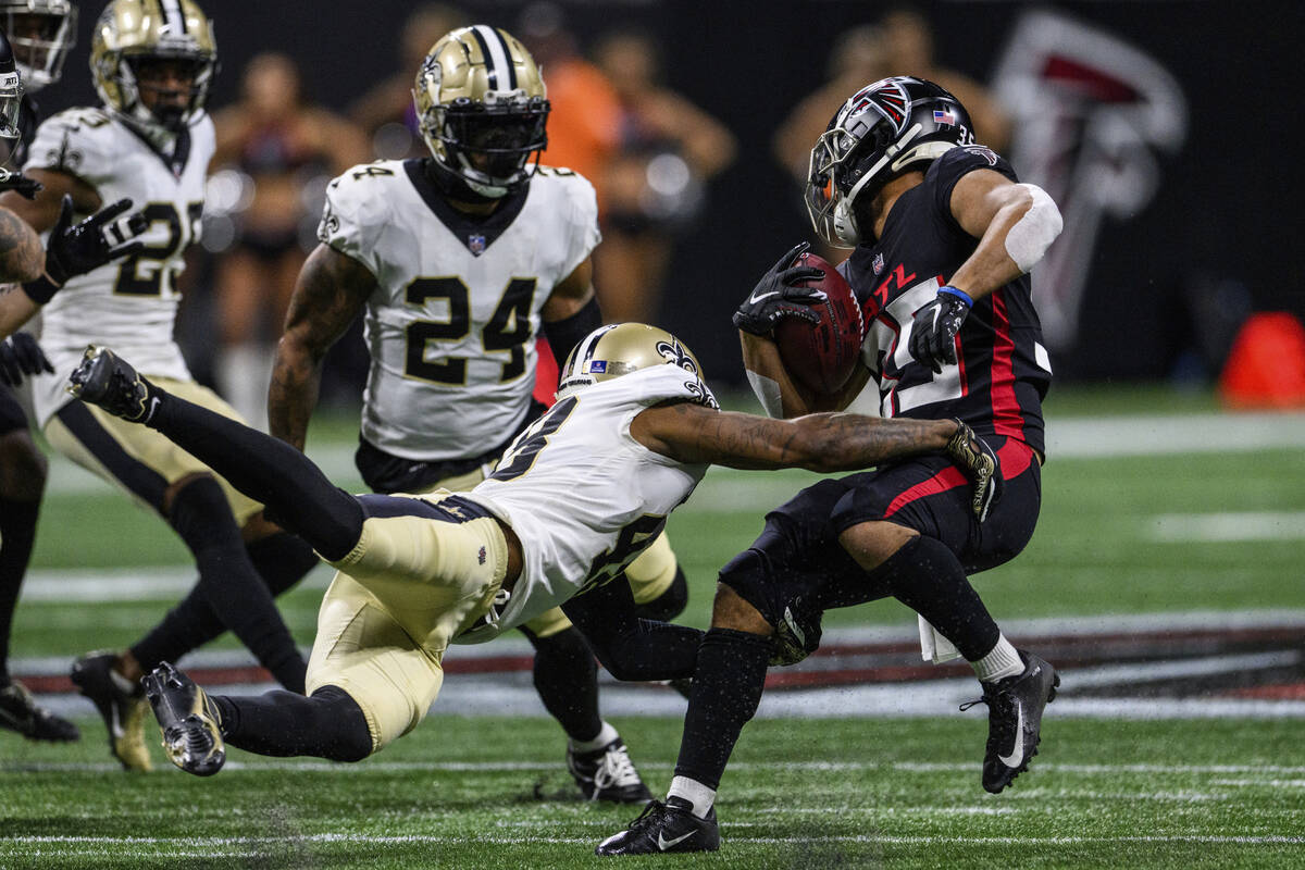 New Orleans Saints defensive back J.T. Gray (48) tackles Atlanta Falcons cornerback Avery Willi ...