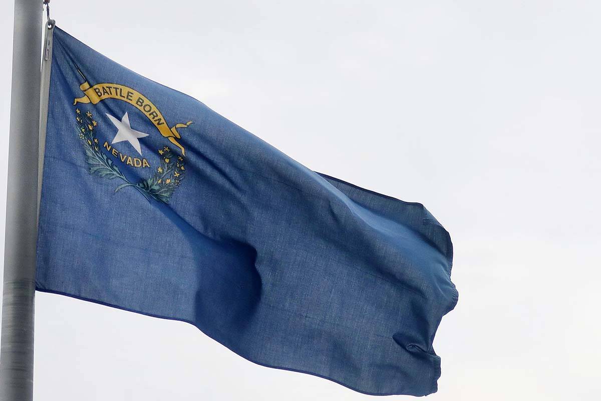 Winds cause flags to wave as grey clouds move in on the Las Vegas Strip, seen at the Thomas &am ...