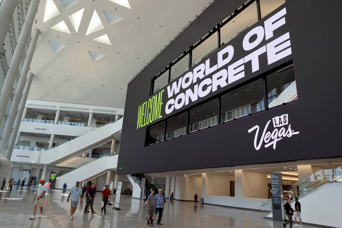 Conventioneers at the World of Concrete trade show in the main lobby at the Las Vegas Conventio ...