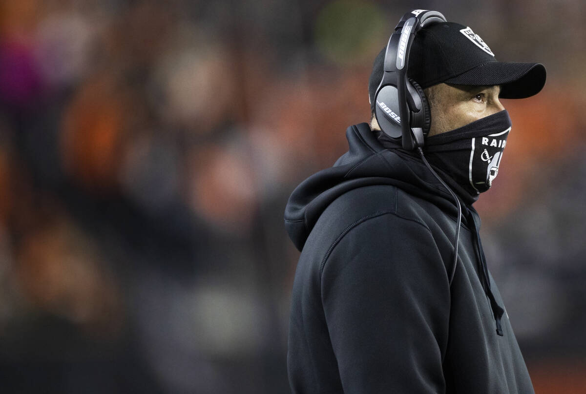 Raiders interim head coach Rich Bisaccia coaches his team in the second half during an NFL play ...