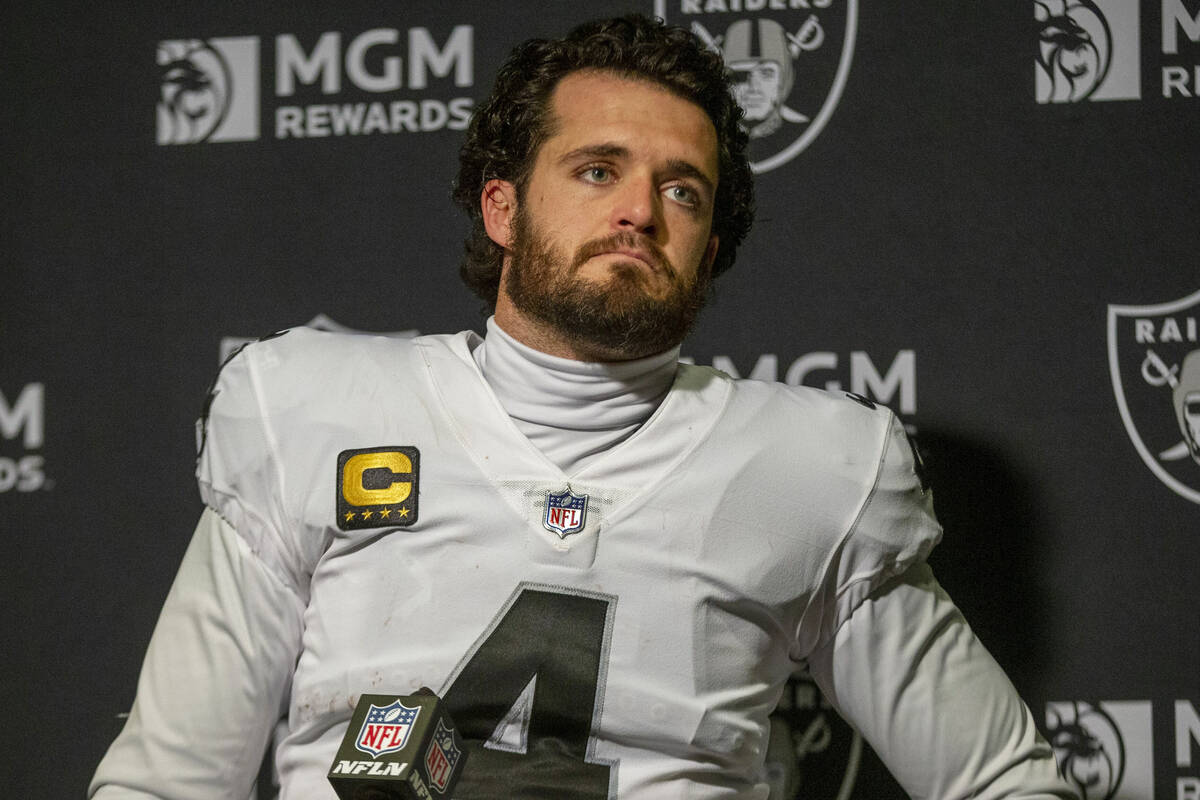 Raiders quarterback Derek Carr attends the postgame news conference after losing an NFL playoff ...
