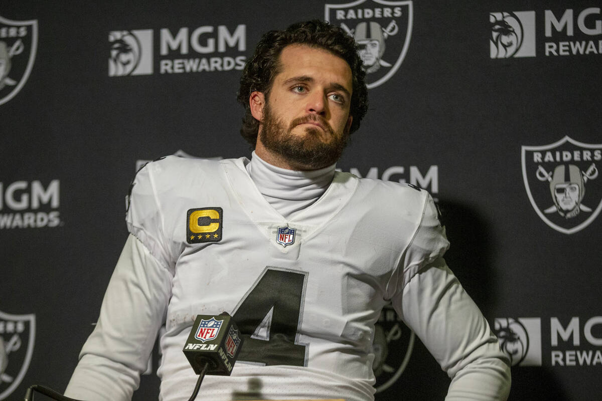 Raiders quarterback Derek Carr attends the postgame news conference after losing an NFL playoff ...