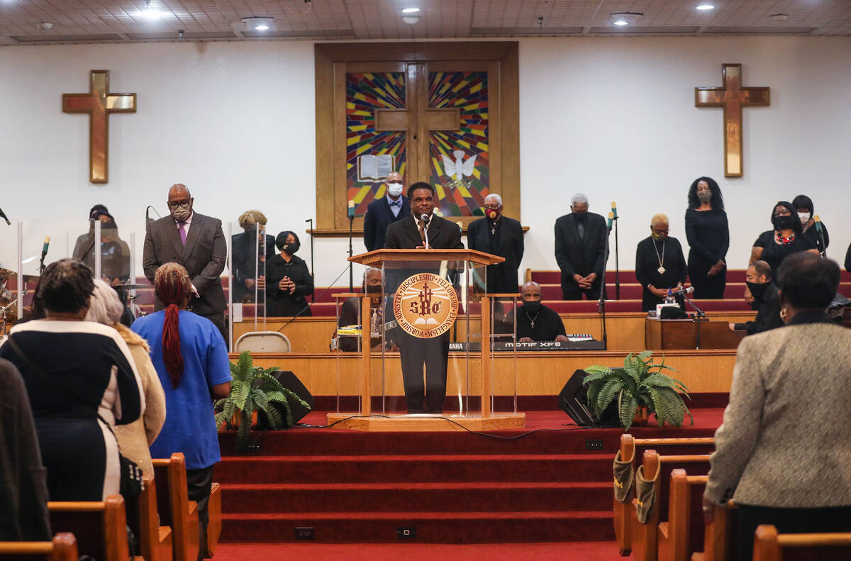 The Rev. Clayton D. Moore addresses the congregation during a service honoring Dr. Martin Luthe ...