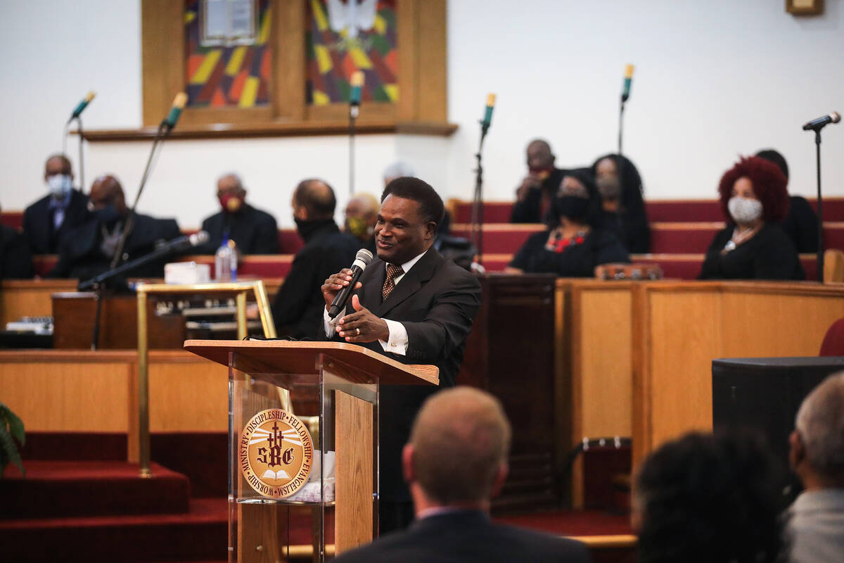 The Rev. Clayton D. Moore addresses the congregation during a service honoring Dr. Martin Luthe ...